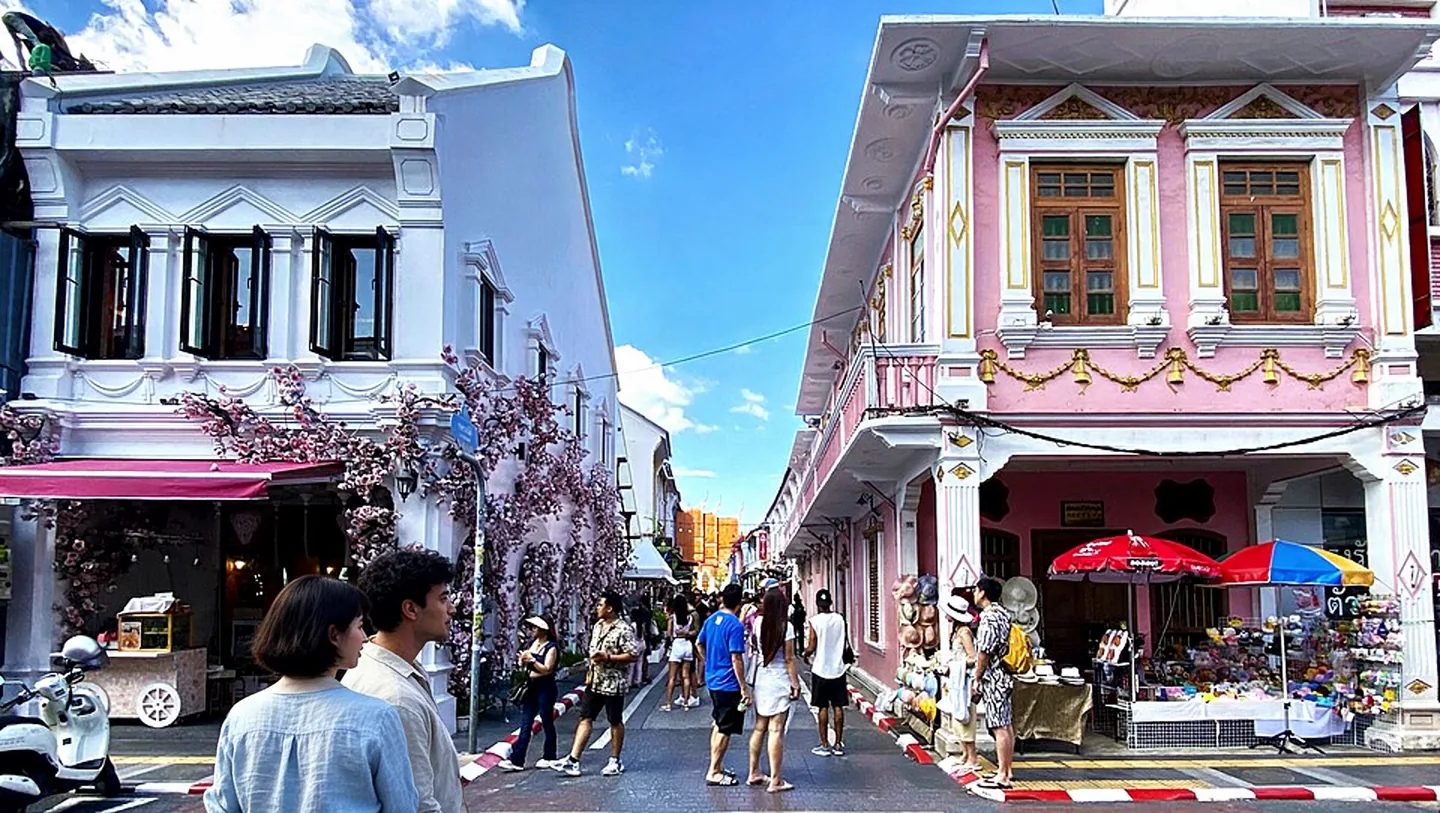Soi Rommanee and its pastel shophouses at the Thalang Road junction